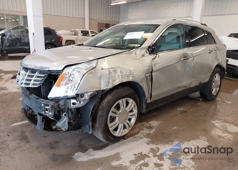 2014 Cadillac Srx Luxury Collection z USA, uszkodzony, nr VIN 3GYFNBE31ES685873